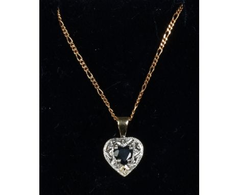 A 9ct gold sapphire heart shaped pendant on chain.