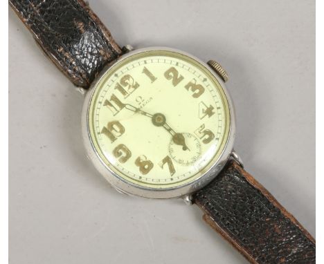An Omega World War I silver cased manual French watch with wire lugs. Condition Report. To be used as a guide only. Subsidiar