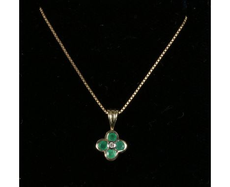 A 9ct gold emerald and diamond quatrefoil pendant on chain.