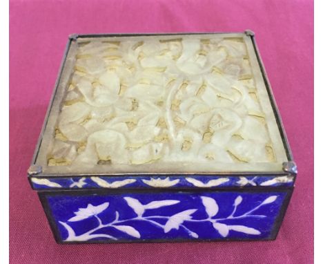 A blue enamel box with jade lid, 8cm square.