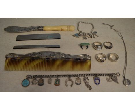 Silver comb covers, silver rings, silver bladed knife, part silver charm bracelets etc