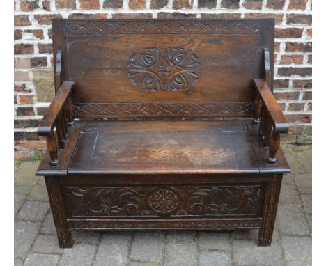 Carved oak monks bench