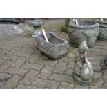 A reconstituted stone garden ornament, a planter and a small bird bath.