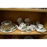 A quantity of Queens China Yuletide pattern dinner and tea ware.