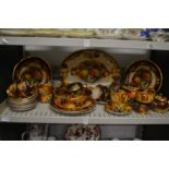 A Quantity of fruit decorated dinnerware.