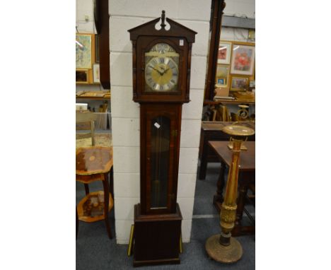 A reproduction mahogany longcase clock.