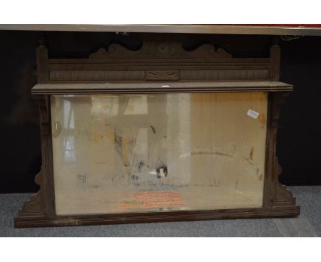 An Edwardian mahogany framed over-mantel mirror.