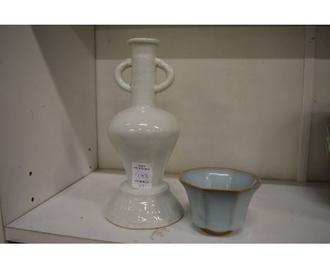 A small Chinese blue glazed bowl and a blanc de chine incense stick holder.