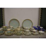 Minton gilt decorated part tea service, other tea ware to include Russian floral decorated cups