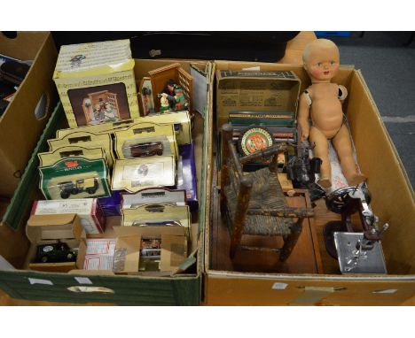 A miniature sewing machine, tin plate Simplex typewriter, boxed, model toy cars etc.