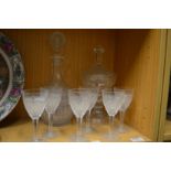 Cut glass ware to include pedestal vase and cover, decanter and six matching glasses.