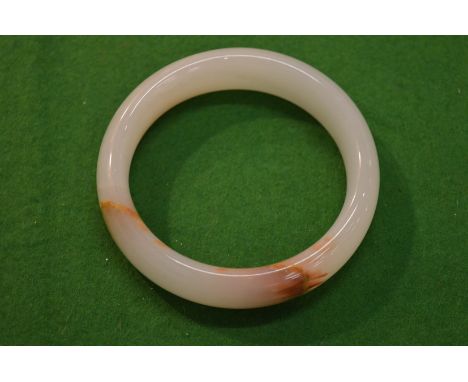 A jade bangle.
