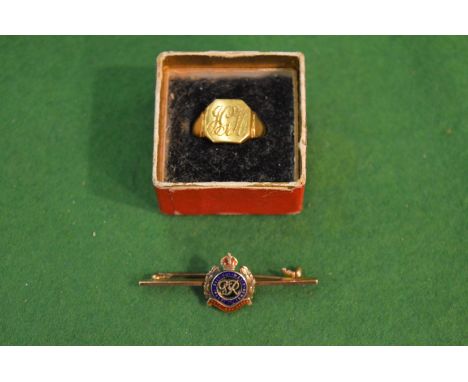 A gold signet ring and a 9 carat gold and enamel Royal Engineers bar brooch.