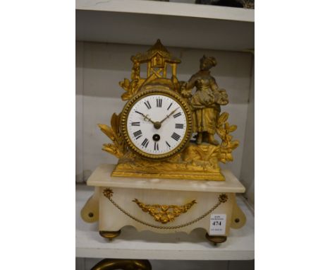 An alabaster and gilt metal French mantel clock.
