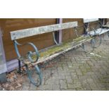 A metal and wooden slatted garden bench.