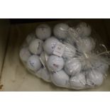 A bag of fifty Pinnacle golf balls.