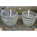 Two reconstituted stone planters.
