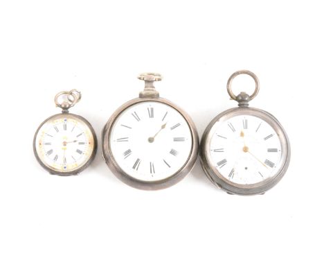 A silver pair case pocket watch, white enamel dial with a roman numeral chapter ring and bulls eye glass, silver case hallmar