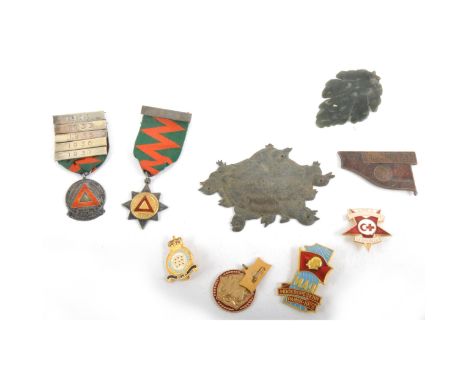A collection of metal badges, enamel, silver, Russian, two silver "National Safety First Driving Association" Drivers Awards,
