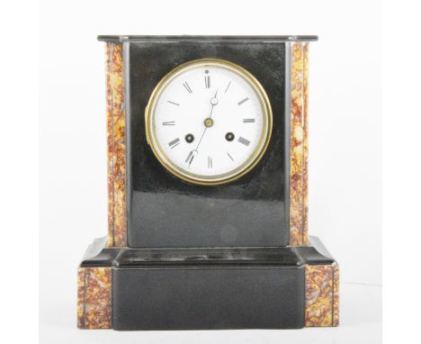 A twin train black slate mantel clock with inlaid marble panels, 10cm white enamel dial with a roman numeral chapter ring, st