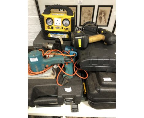 Collection of power tools.
