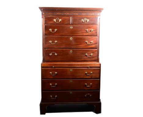 A George III mahogany chest on chest, dentil moulded cornice, blind fretwork frieze, upper section with two short and three l