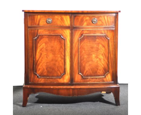 A reproduction mahogany bowfront side cabinet, two frieze drawers above cupboards, shaped apron, splayed bracket feet, width 