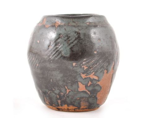 A stoneware vase by William 'Bill' Marshall at the Leach Pottery, swollen form with cut sides, with speckled tenmoku glaze, p