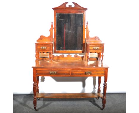 Victorian walnut dressing table, rectangular mirror-back with raised trinket drawers, the base with two frieze drawers, turne