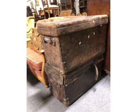 Old leather trunk, marked Duke maker, Northampton; together with a similar trunk, both defective; together with two suitcases