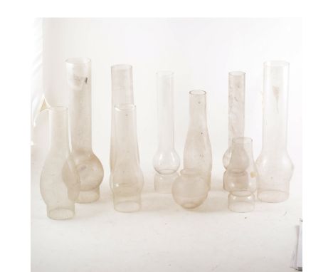 A collection of ten oil lamp chimneys, 54cm and smaller. (10)