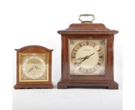 An Elliott walnut cased mantel clock, the dial signed Thornton, Kettering, seraphim spandrels, 16cm; and a Bulova quartz mant