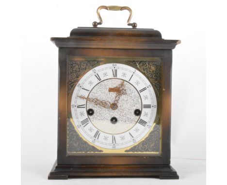 Modern walnut bracket clock, Georgian style, circular dial with Roman chapter ring, kienzle movement striking on five gongs, 