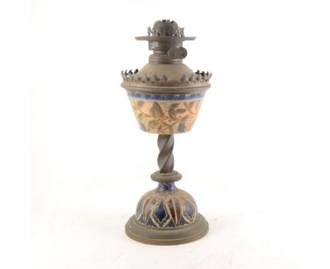 A Victorian brass and stoneware oil lamp, stoneware probably Doulton Lambeth, twisted column, removable reservoir, 41cm.