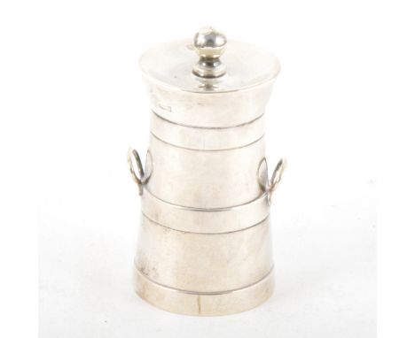 A silver peppermill by Haseler &amp; Bill, Chester 1920, churn-shape, 9cm.