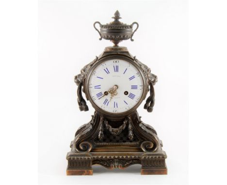 A Louis XVI style ormolu mantel clock, Villard a Paris, mid 19th century, white enamel dial, balloon case with urn finial ove