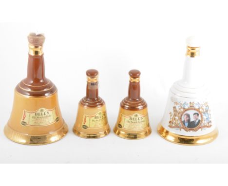 Bells Scotch Whisky Commemorative decanters; a set of graduating set of Bell decanters and other commemorative bottles of bee