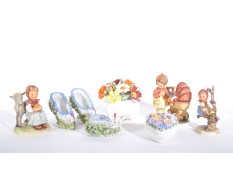 A collection of small decorative ceramics, Hummel figures by Goebel, moss ware,