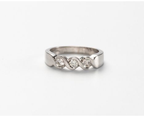 Split-bezel set to the centre with three round brilliant-cut diamonds weighing approximately 0.37cts in total, approximate co