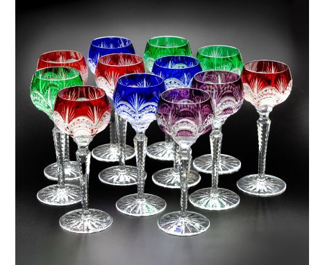 Each with faceted stem and star-cut base, colours comprising: 2 amethyst, 3 green, 3 cobalt and 4 red(12)