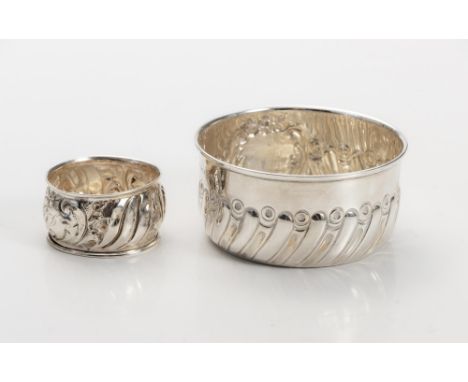 Circular, gadrooned body, centred with a cartouche inscribed 'JRG', 8,5cm diameter, 49g; And a Silver Napkin Ring, 4,5cm diam