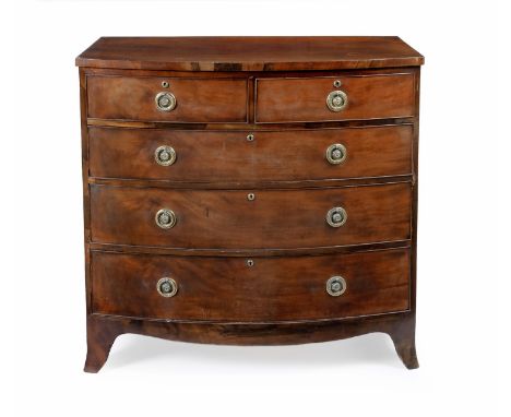 The bow fronted top above a pair of short cockbeaded frieze drawers, three long graduated cockbeaded drawers below, on French