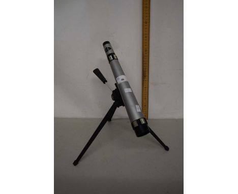 Small telescope on tripod base