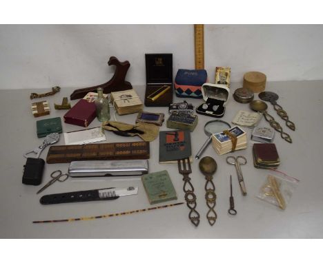 Box of mixed items to include magnifying glass, various cards, card case, novelty camera cigarette lighter, bottle opener etc