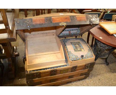 Wood and metal bound dome top trunk with fitted interior