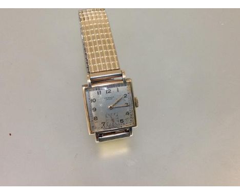 A vintage J.W. Benson gentleman's 9ct gold wristwatch, the square silvered dial with Arabic numerals, with subsidiary seconds
