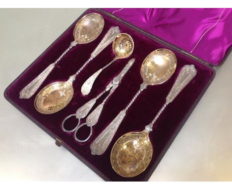 A 19th century silver-plated cased six-piece fruit service, comprising a set of four serving spoons, sifting spoon and grape 