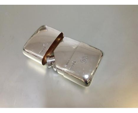 A George V Scottish silver hip flask of unusual design, Hamilton &amp; Inches, Edinburgh 1923, the plain rectangular case sha