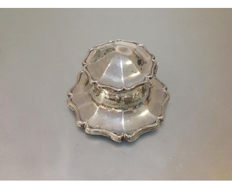 A George V silver capstan inkwell, Martin Hall &amp; Co., Sheffield 1915, the hinged cover and base with scalloped rim, and w