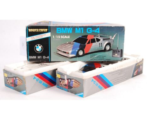 A set of three vintage Radio Tron RC Remote Controlled 1/15 scale model BMW M1 G-4. Each appear complete in their original bo